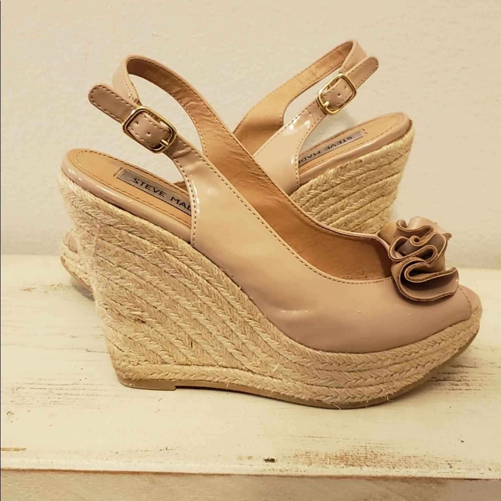 Great Steve Madden Wedges for sale

Size 7 1/2